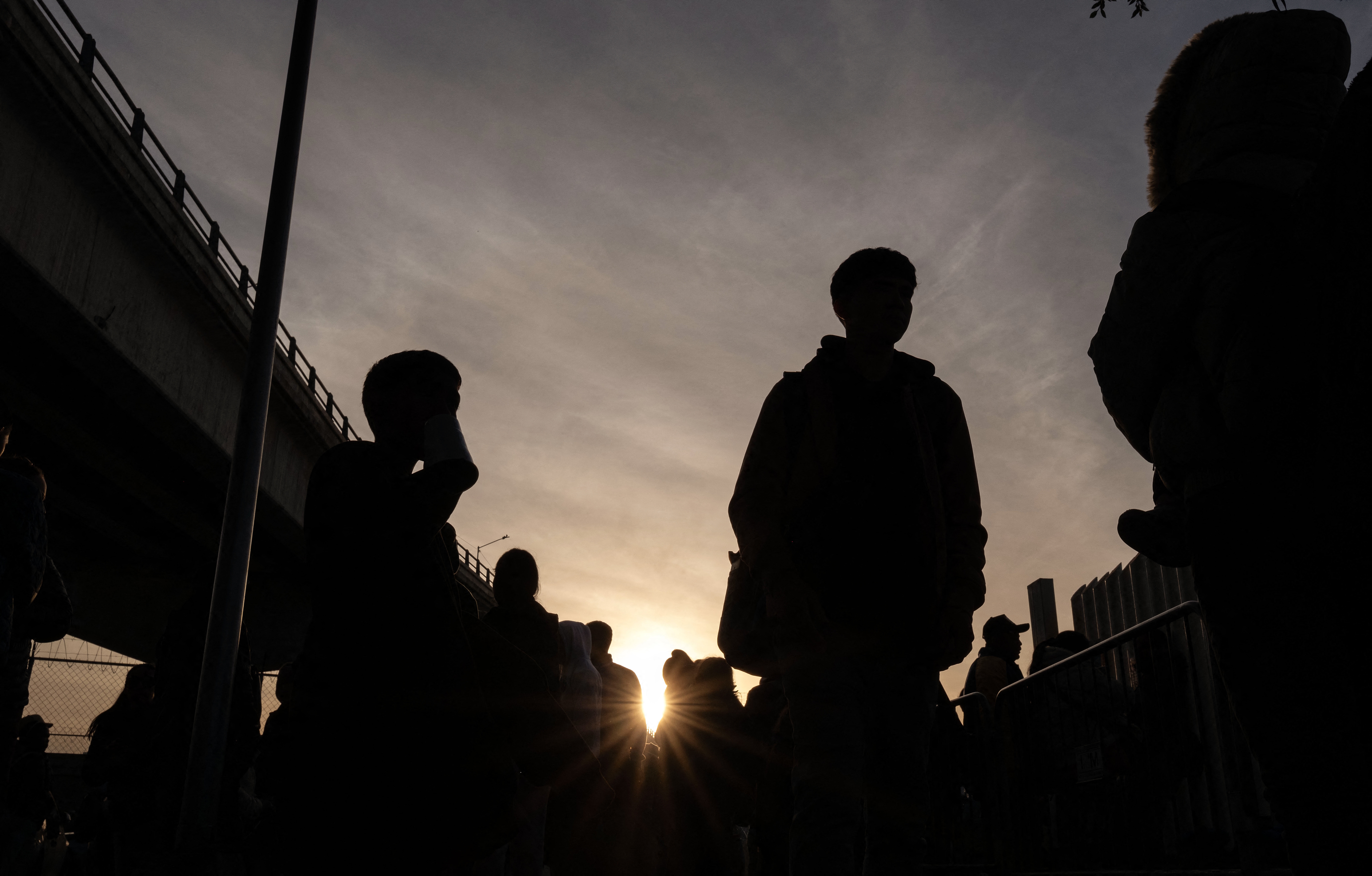 Asylum-seekers wait for their CBP One appointments with U.S. authorities before crossing through El Chaparral port of entry in Tijuana, Mexico, on Jan. 20.
