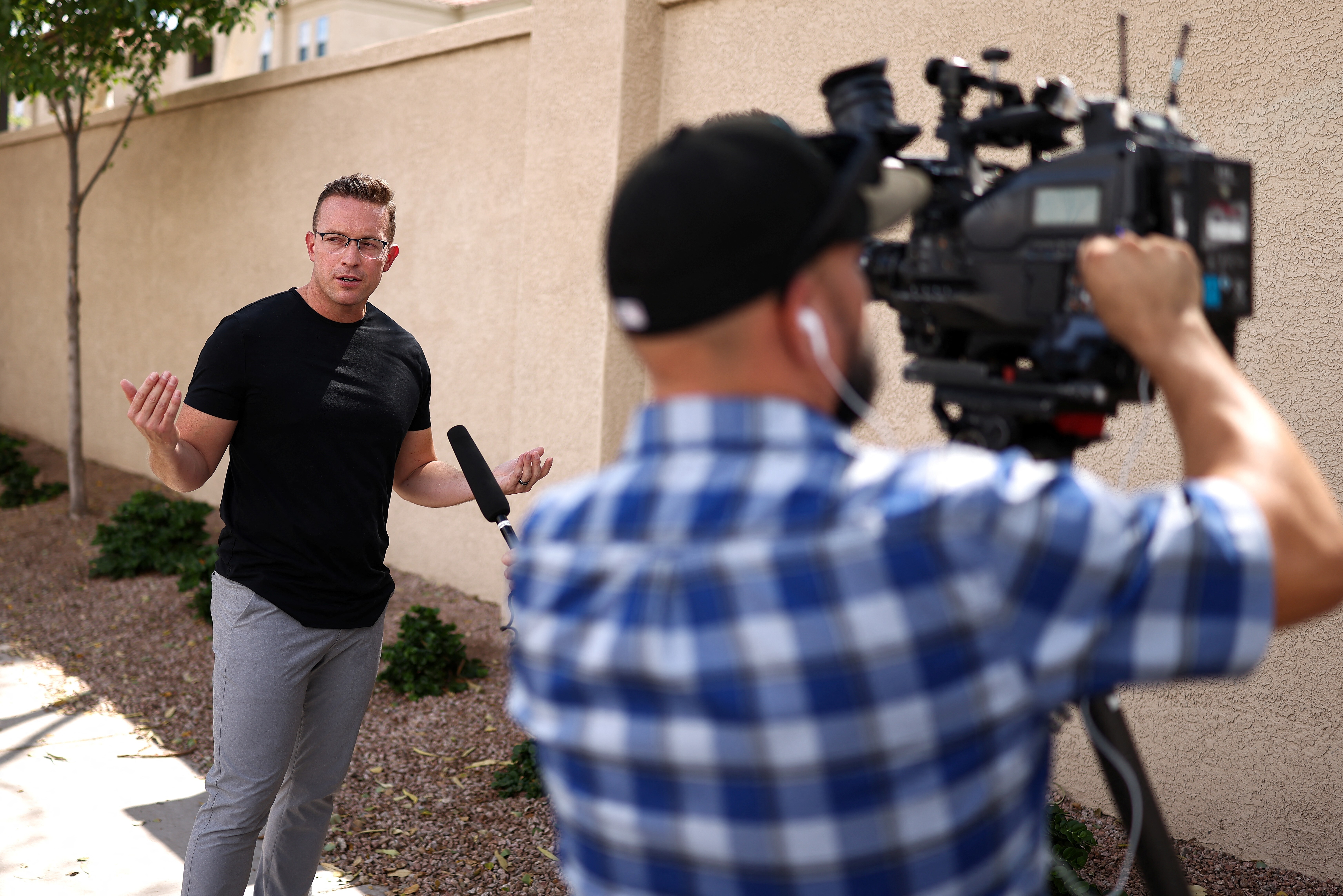 Pro-Trump influencer and YouTuber Benny Johnson being interviewed in Phoenix earlier this year. Johnson is one of many political influencers with close ties to the Trump administration.
