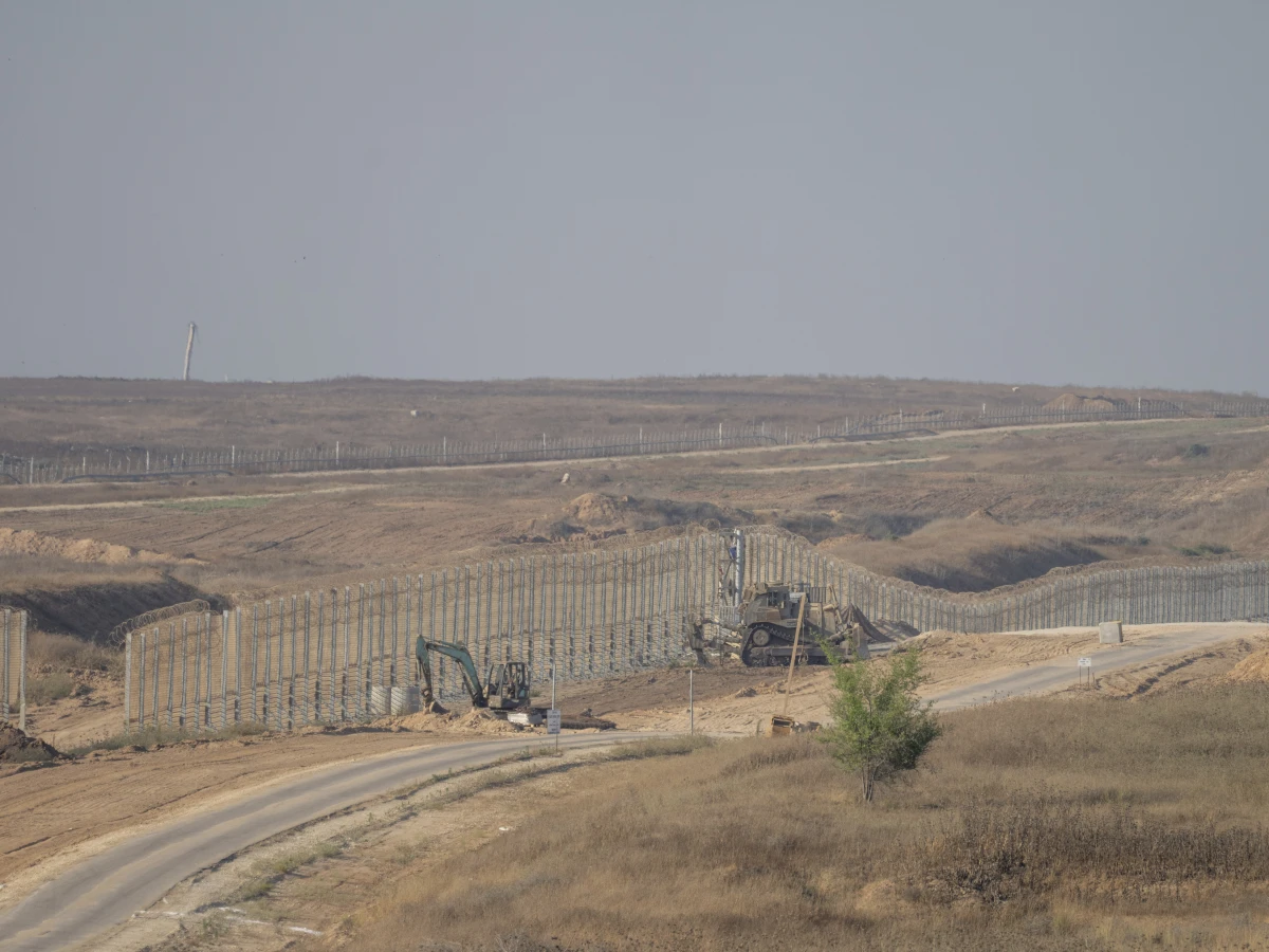 Israeli army bulldozers are seen near the Gaza Strip border, in southern Israel, on Thursday. Israel's military said on Saturday that eight soldiers were killed in southern Gaza in the deadliest attack on Israeli forces in months.