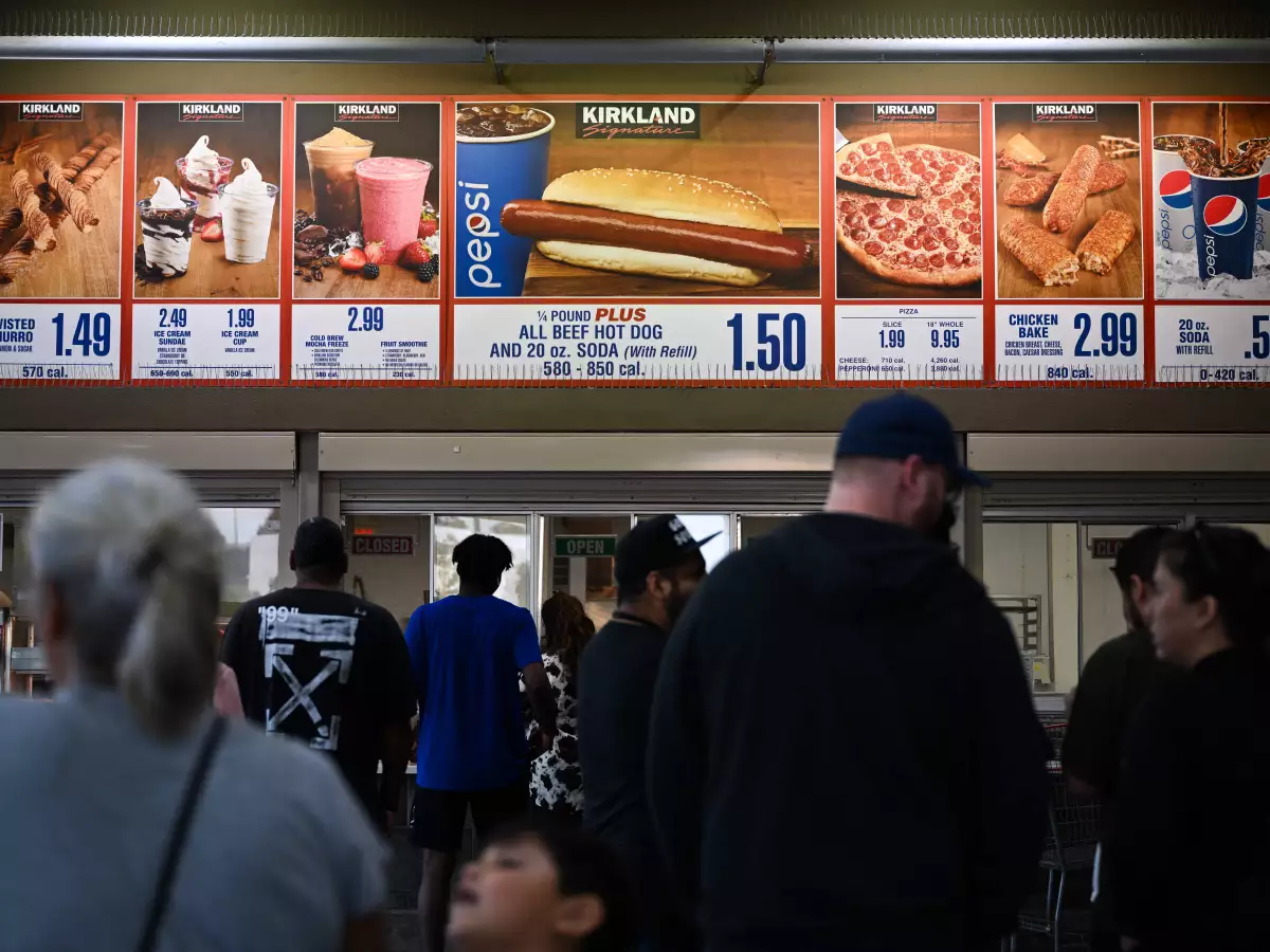Customers wait in line at a Costco food court in Hawthorne, California.