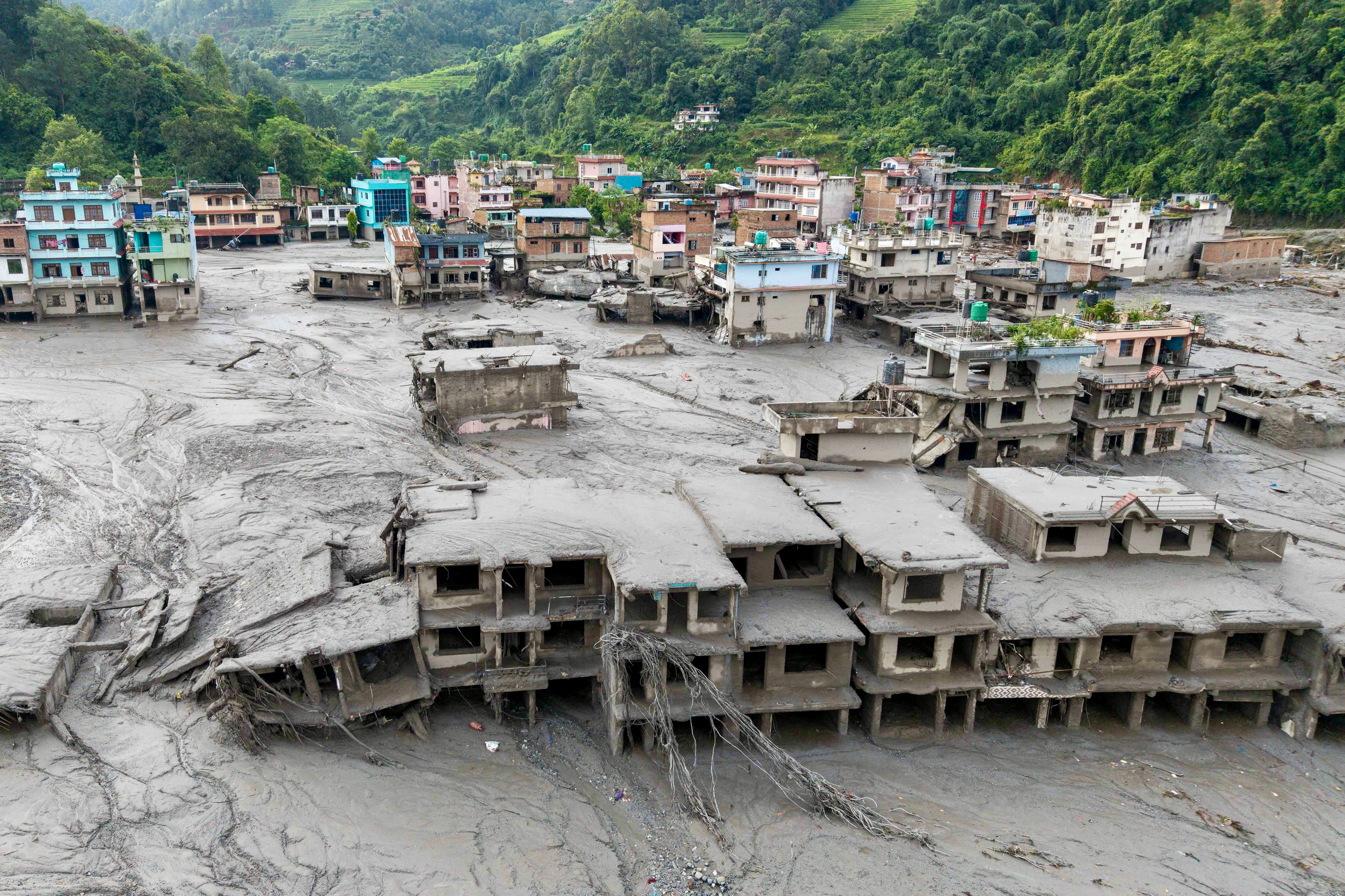 Floods kill more than 500 people in Nepal and Tibet, with 90 Americans among the missing
