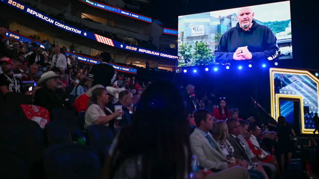 Sen. John Fetterman, D-Penn., is displayed on a screen as he delivers a video message during the Republican National Midterm Convention at the American Airlines Center in Dallas on Wednesday.