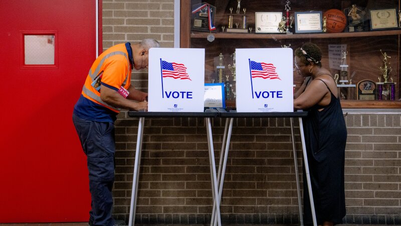 People vote in the primary election at Northwestern High School in Detroit, Tuesday.