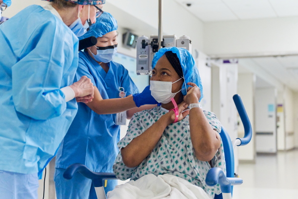 Towana Looney, 53, of Gadsden, Ala., gets ready to head into the operating room at NYU Langone Health in New York City to get a genetically modified pig kidney transplant.