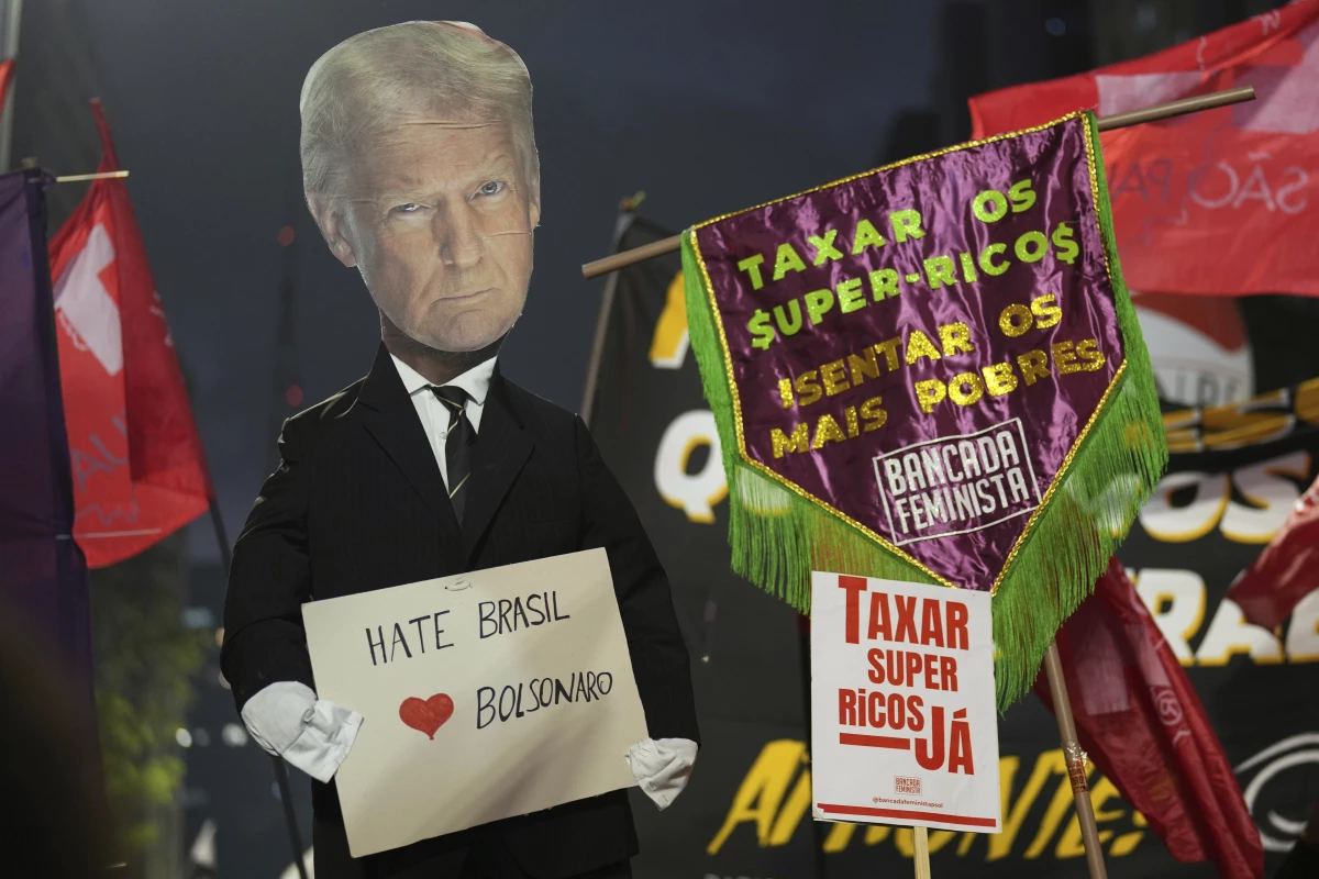 Protesters hold up an effigy of U.S. President Donald Trump in response to Trump's announcement of 50% tariffs on Brazilian goods, in Sao Paulo, Thursday, July 10.