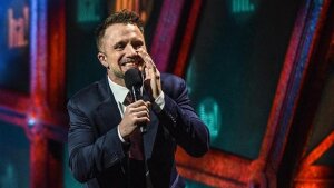 To reach others in the deaf community, stand-up comedian D.J. Demers is often joined on stage by a sign language interpreter. Jennifer Lees (left) has interpreted many of his performances including the 2024 All Access Comedy Show in Halifax, Nova Scotia.
