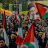 Iranians hold pictures of Hezbollah leader Hassan Nasrallah, who was killed in an Israeli air strike on Beirut's southern suburbs on Sept. 27, during an anti-Israel protest in Palestine Square in Tehran on Sept. 30.