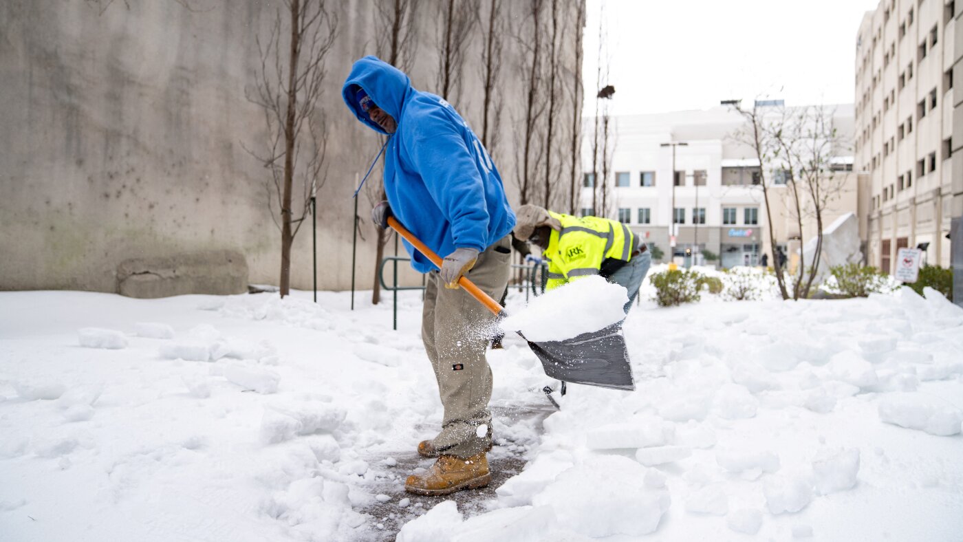 Power outages and canceled flights as winter storm brings snow, sleet and ice