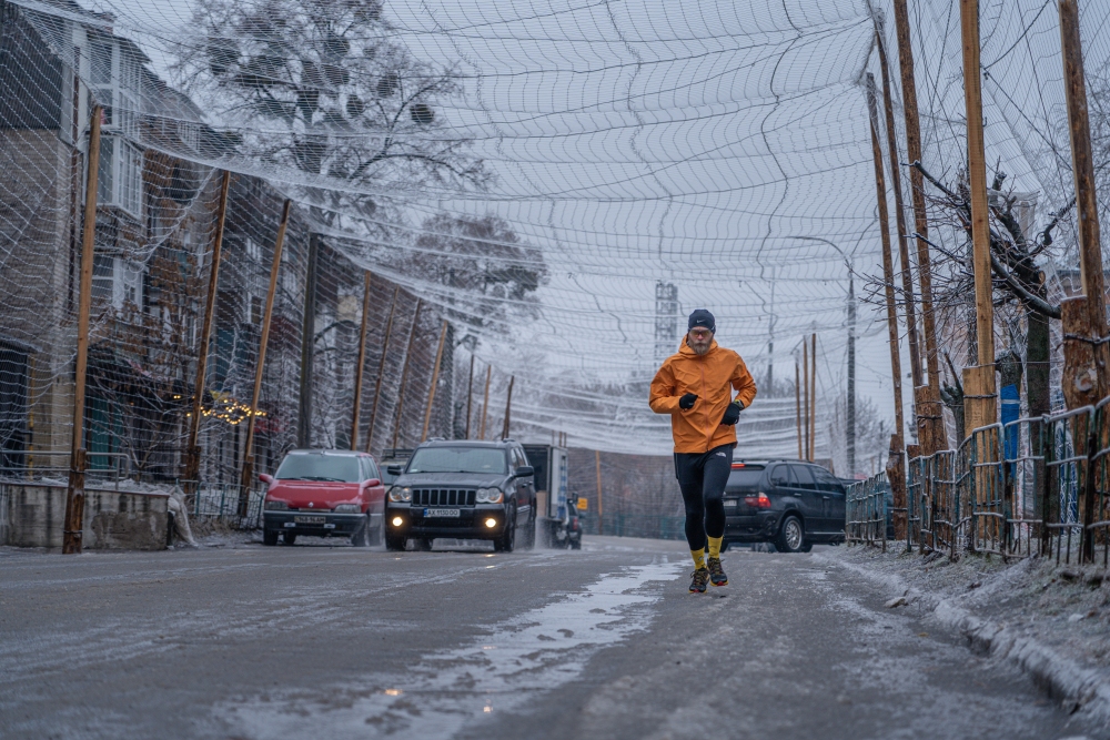 Drone nets cover the streets of Izium, Ukraine, on Feb. 7. The netting discourages drones from diving at cars and people because their propellers get tangled in it.