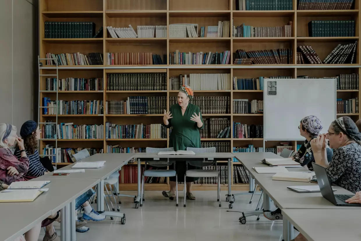 Rabbanit Batya Krauss leads a women's study session at Matan – The Sadie Rennert Women's Institute for Torah Studies in Raanana, Israel. Matan is an Israeli institute dedicated to advanced Torah learning and Jewish studies for women, offering educational programs and leadership training.