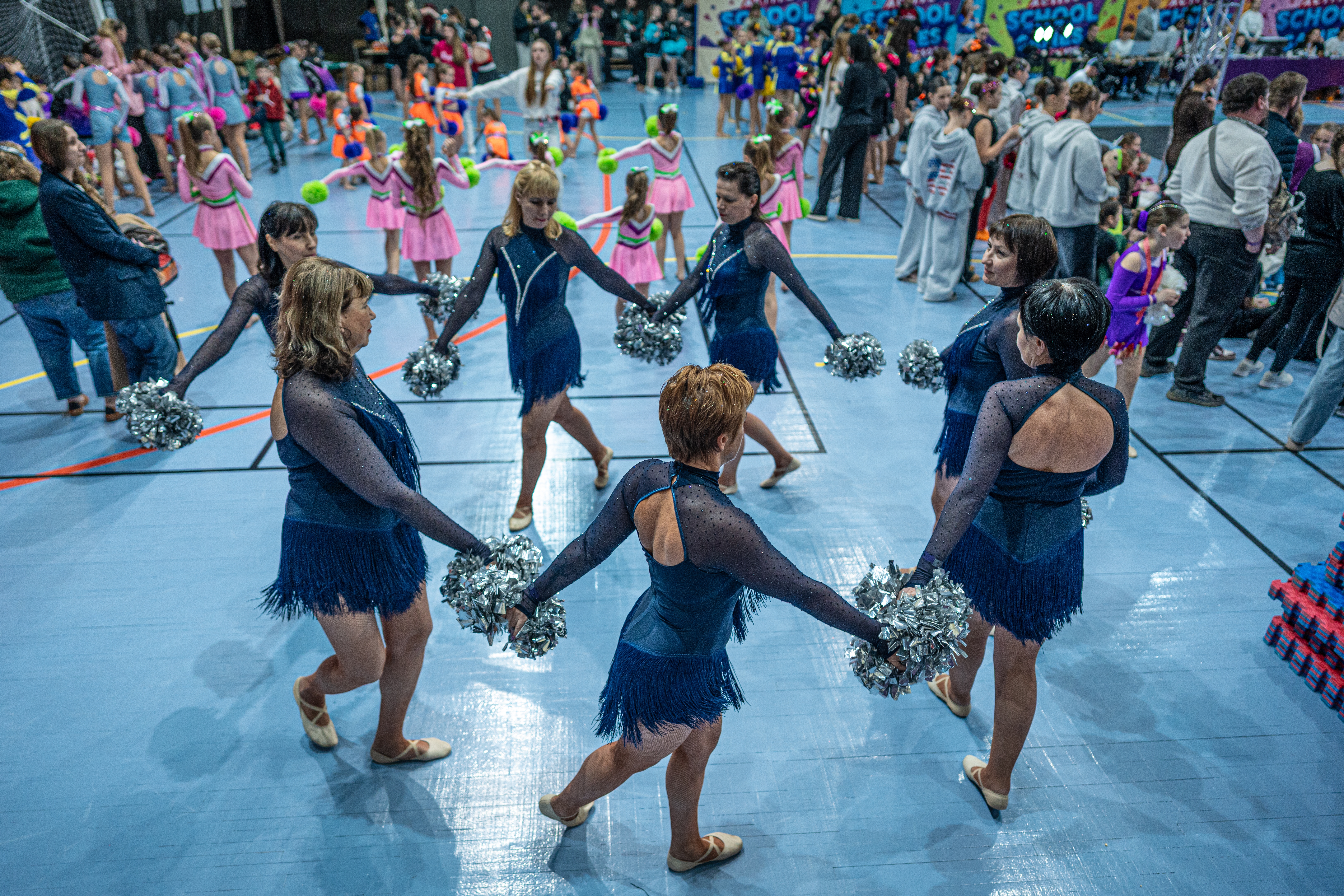 A team of midlife cheerleaders in Ukraine refuses to let war defeat them