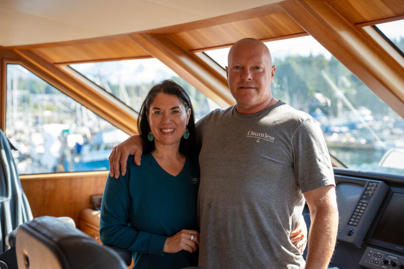 Alisa Jestel and Jim Edgars stand in the wheelhouse of the Dauntless in July 2026.