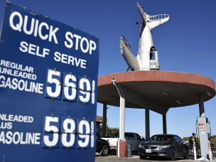 Gas prices displayed in California's 22nd Congressional District on Oct. 17, near Fresno, California. Democrat Randy Villegas is challenging Republican incumbent David Valadao in the redrawn 22nd Congressional District, amid local concerns about federal cuts to Medicaid and food assistance, as well as intensified Immigration and Customs Enforcement (ICE) operations.