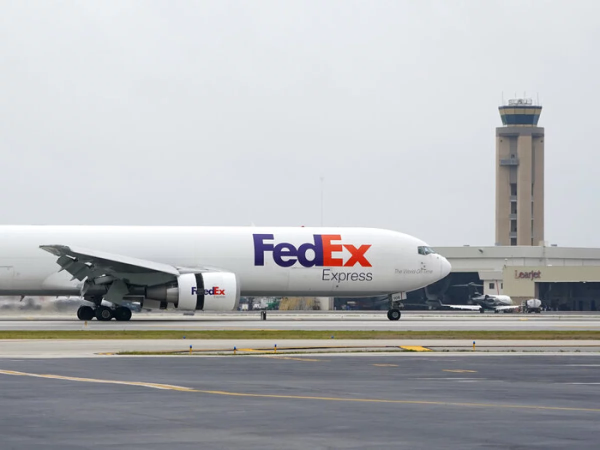 A FedEx Boeing 767 cargo plane similar to this one, seen here in Fort Lauderdale, Fla., almost collided with a Southwest jet at the international airport in Austin, Texas, last year. Safety investigators say an air traffic controller's mistake was to blame and that critical safety technology might have prevented the incident.