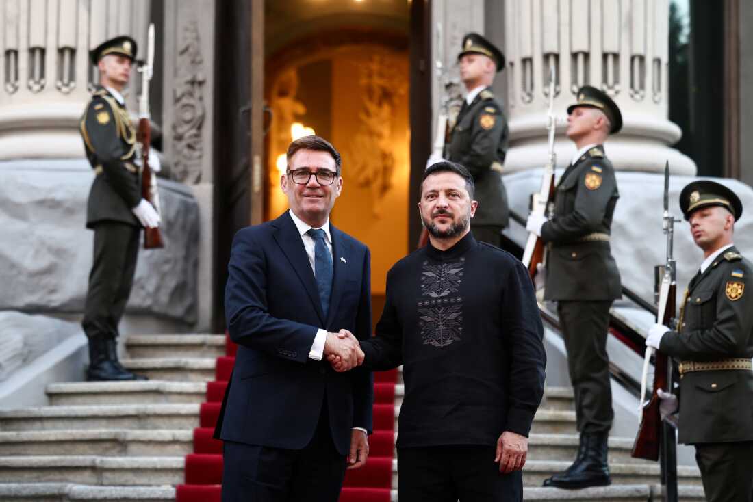 Ukraine's President Volodymyr Zelenskyy welcomes and shakes hands with Britain's Prime Minister Andy Burnham upon his arrival at Horodetskyi House ahead of their bilateral meeting in Kyiv, Monday, Aug. 24, 2026. 