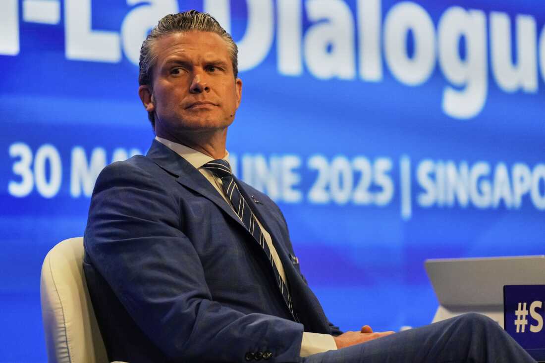 U.S. Defense Secretary Pete Hegseth waits to deliver his speech at the 22nd Shangri-La Dialogue summit in Singapore on Saturday.