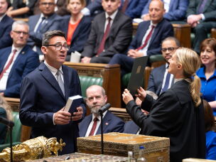 Andy Burnham is sworn-in as a member of Parliament in the House of Commons in London, on June 22.