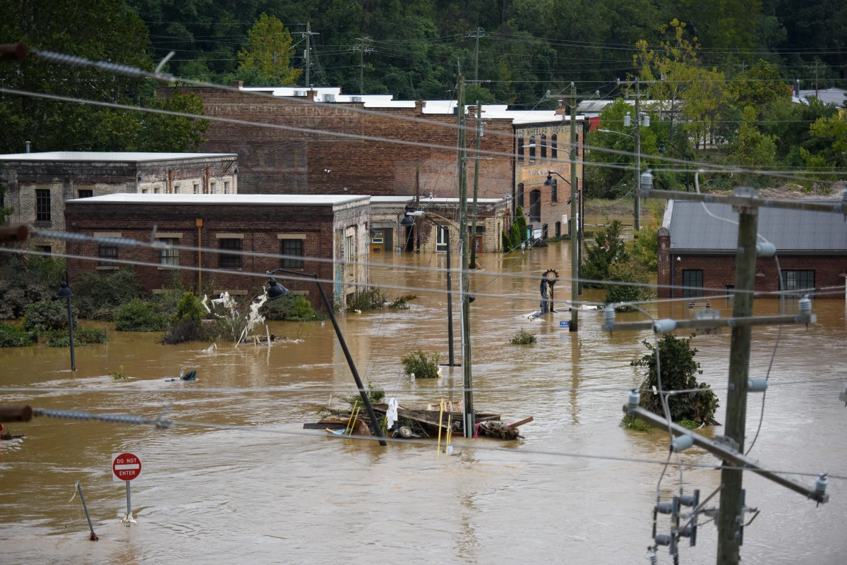 Heavy rains from hurricane Helene caused record flooding and damage in Asheville, North Carolina.