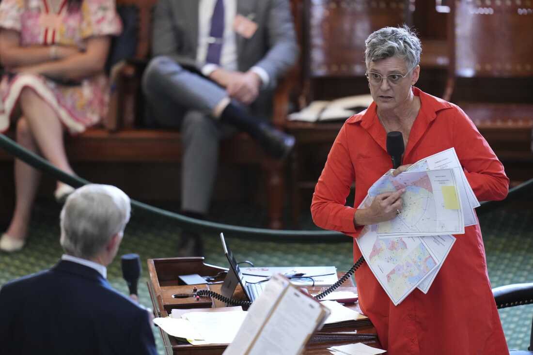 Texas state Sen. Sarah Eckhardt, a Democrat, right, questions Republican Sen. Phil King during debate in August over the Republican-backed district map that a federal court blocked and called a racial gerrymander on Tuesday.