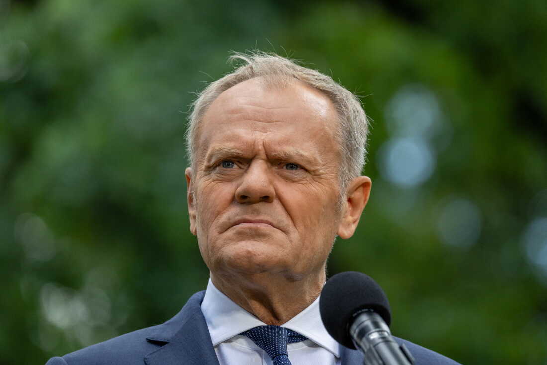FILE - Poland's Prime Minister Donald Tusk speaks to the press during a press conference in the gardens of the Prime Minister's Chancellery building in Warsaw on July 3, 2026.
