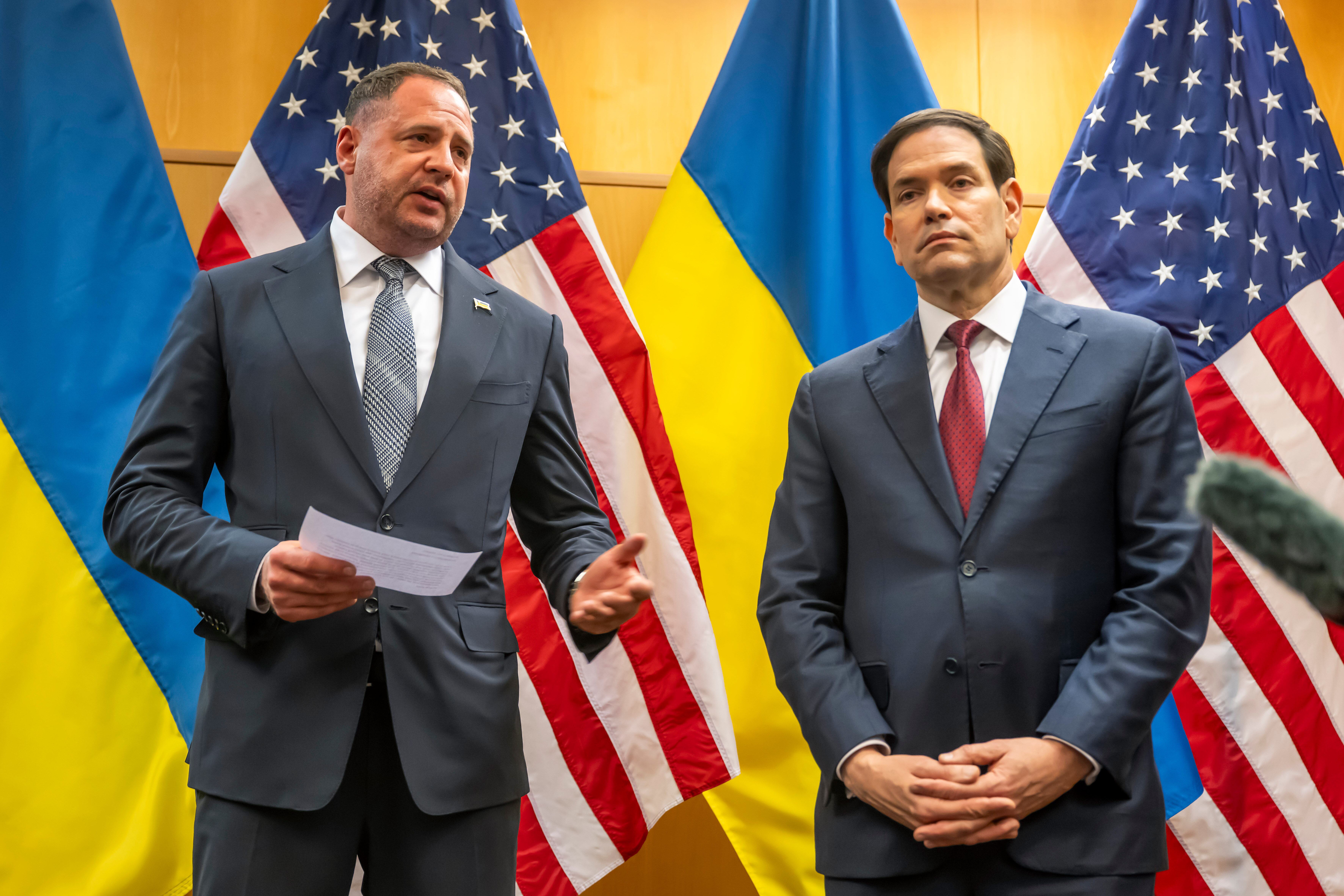 Head of the Office of the President of Ukraine Andriy Yermak, second right, and U.S. Secretary of State Marco Rubio talk to the press as their consultations continue at the U.S. Mission to International Organizations in Geneva, Switzerland, Sunday, Nov. 23, 2025.