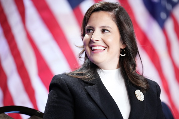 House Republican Conference Chair Rep. Elise Stefanik, R-N.Y., listens as President-elect Donald Trump speaks at the House Republicans Conference meeting at the Hyatt Regency on Capitol Hill on Nov. 13.