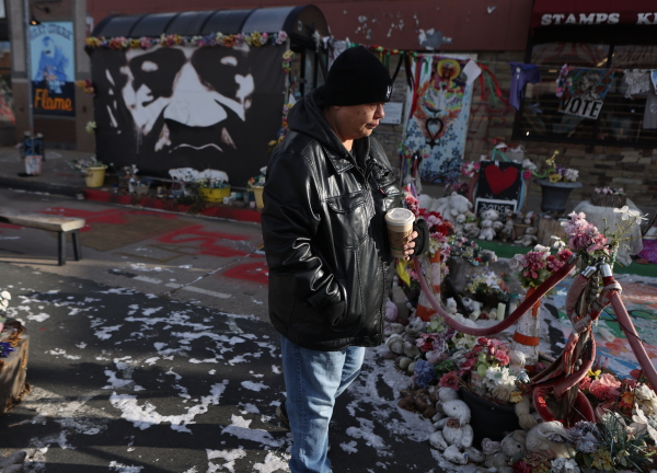 Sequeerity founder Kimmy Hull at the site of where George Floyd was murdered by Minneapolis Police officers in 2020 in Minneapolis on Dec. 5.