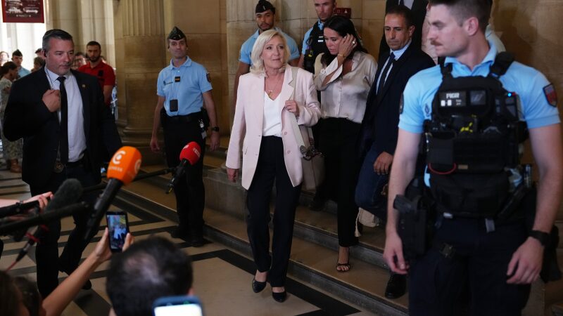Far-right leader Marine Le Pen leaves the courtroom after the verdict of her appeal trial, in Paris, France, Tuesday, July. 7, 2026.