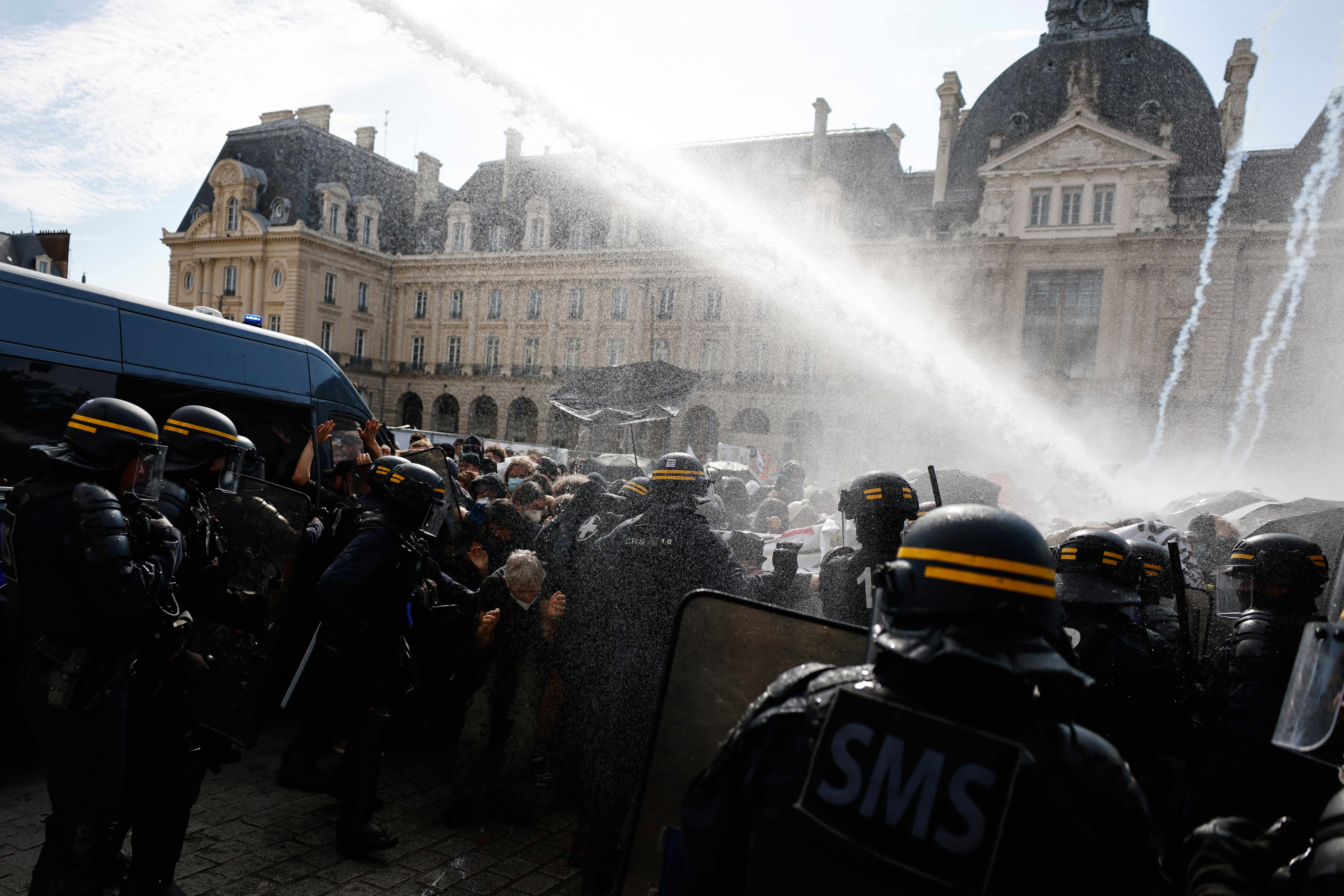 France's police fire tear gas and water cannons as school protests sweep the country