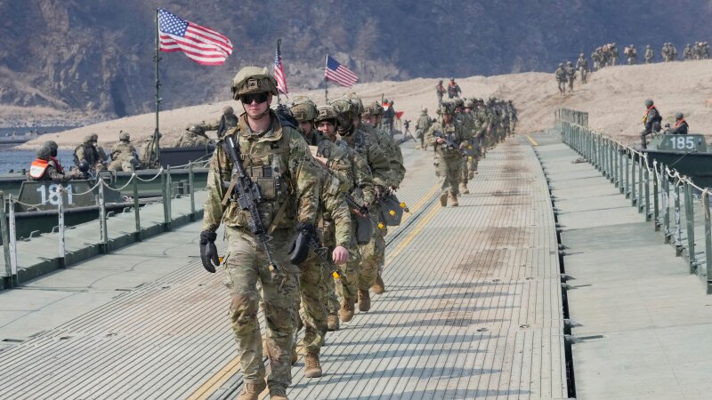 FILE - U.S. Army soldiers cross a floating bridge on the Imjin River during a joint river-crossing exercise between South Korea and the United States as a part of the Freedom Shield military exercise in Yeoncheon, South Korea, March 20, 2025. (AP Photo/Ahn Young-joon, File)