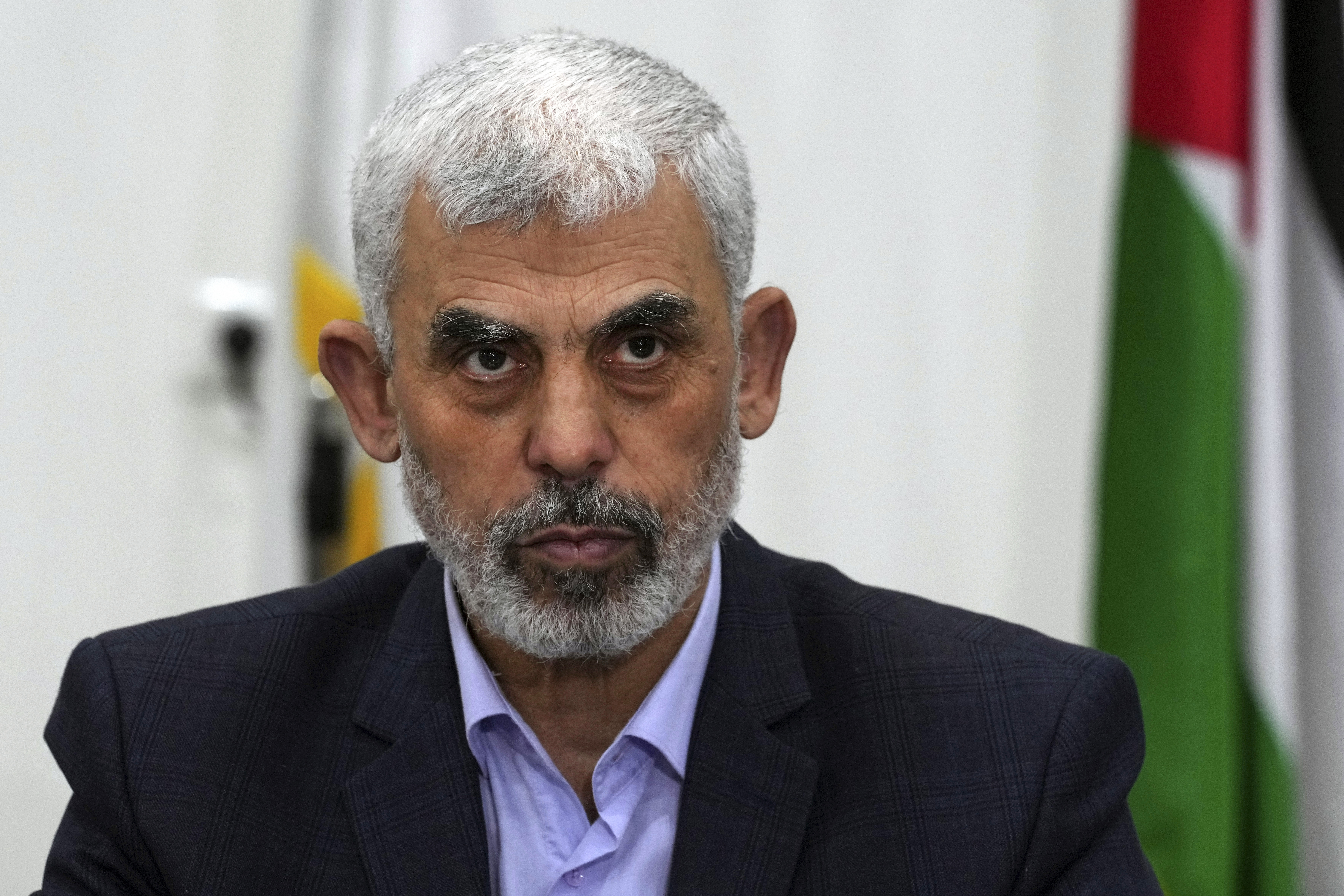 Hamas' Yahya Sinwar chairs a meeting with leaders of Palestinian factions at his office in Gaza City, April 13, 2022. (AP)