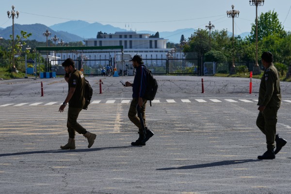 Police officers take position in Islamabad, Pakistan, to ensure security ahead of possible negotiations between Iran and the United States, Friday, April 10, 2026.