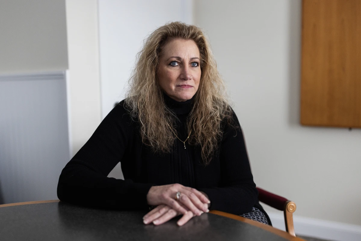 Marlean Ames in her lawyer's office in Akron, Ohio, on Feb. 20. Ames claims she was passed over for jobs because she is a straight woman and that gay people were given positions she was more qualified for.