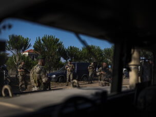 On July 22, 2026, a Lebanese Army soldier at the entrance to Zawtar al-Gharbieh, southern Lebanon. Lebanese residents forced to leave their homes months ago are now slowly returning to a devastated town without electricity or running water.