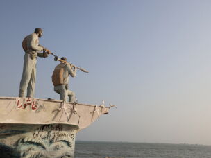 A sculpture overlooking the Strait of Hormuz is seen along the seafront in the port city of Bandar Abbas, in southern Iran, on Aug. 10.