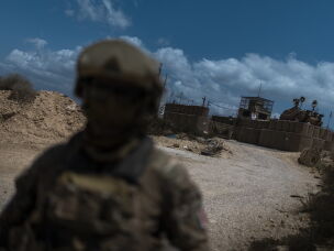 French UNIFIL peacekeepers patrol outside a military position taken over by the Israeli army. Israel has established a restricted buffer zone beyond the newly drawn