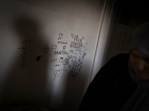In Zawtar al-Gharbieh, drawings cover the walls of the hallway of a home occupied by Israeli soldiers, with drawings covering the walls.