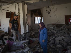 Mahasen Fakih in her destroyed apartment. She returned to Zawtar al-Gharbieh recently after being displaced to the Chouf region, but there is still fighting nearby.