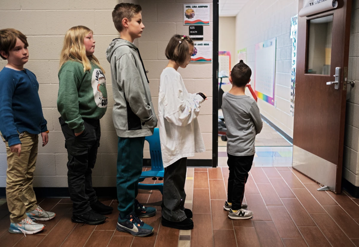 Kellen Hedler leads his fellow classmates at Frontier Elementary School near Oklahoma City. Kellen has Down syndrome, a genetic condition that causes a range of physical and developmental challenges.