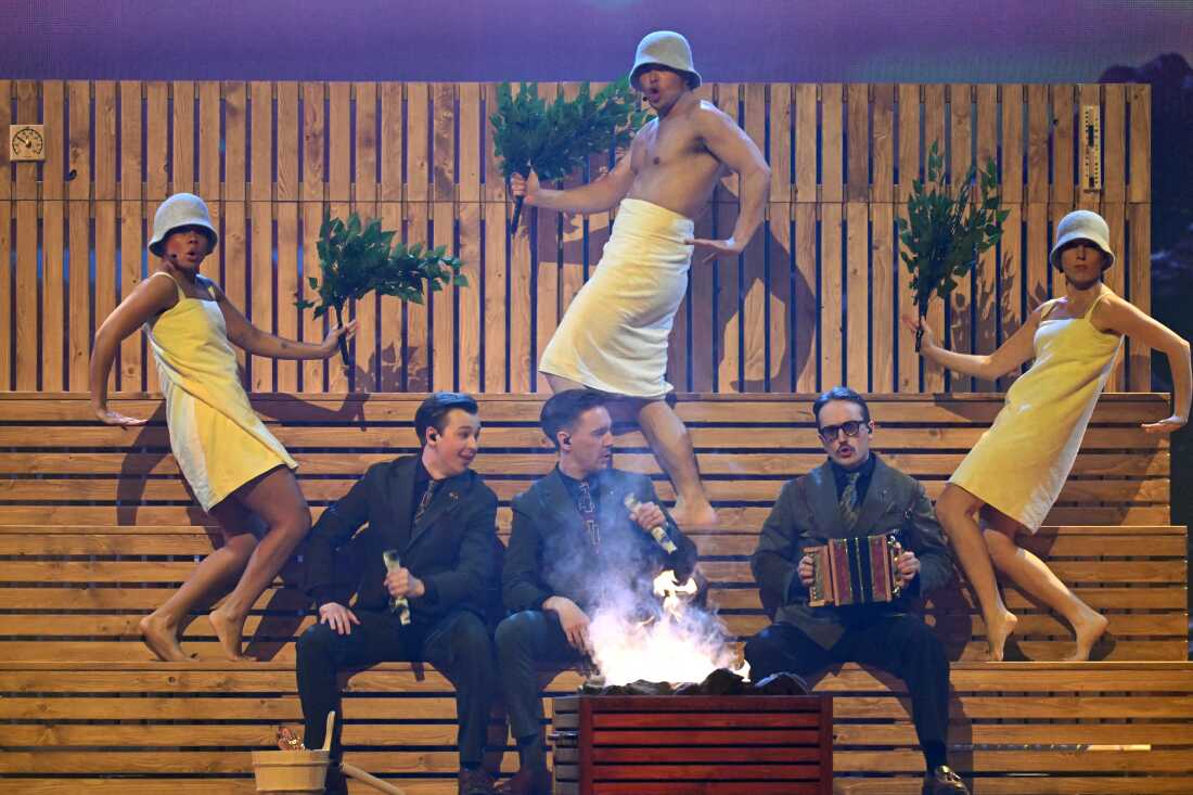 Finnish Group Kaj representing Sweden with the song "Bara Bada Bastu" performs during the first semi-final of the Eurovision Song Contest 2025, on May 13, 2025.