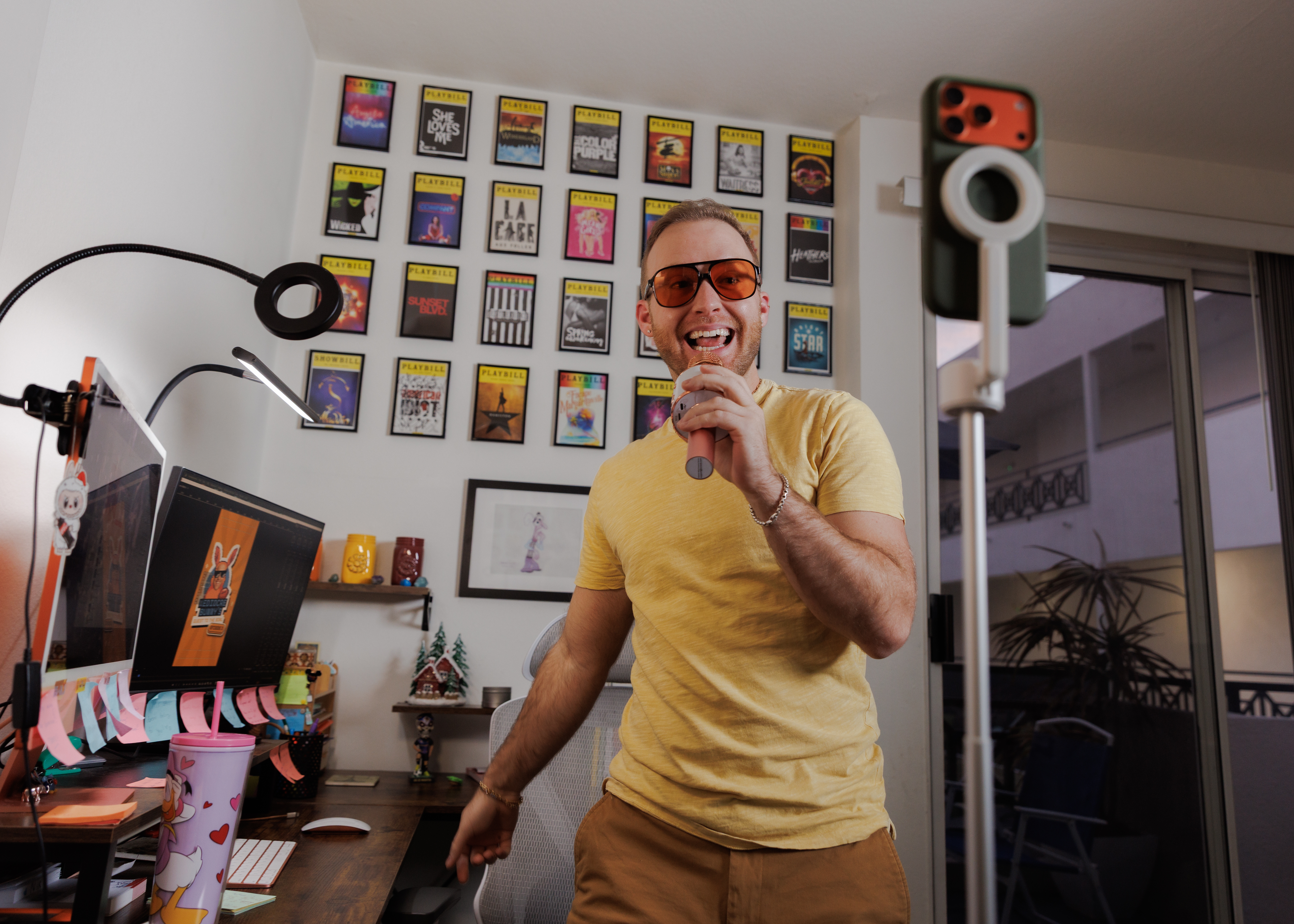 Niklaus Miller, 29, is photographed in his bedroom in Los Angeles, where he practices and films his social media videos. Not a native Spanish speaker, Miller committed to learning all of Bad Bunny