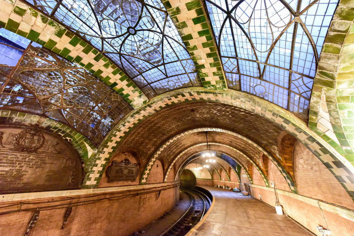 Old City Hall Station, an abandoned subway terminal in Manhattan, features vaulted ceilings, brass chandeliers and skylights.