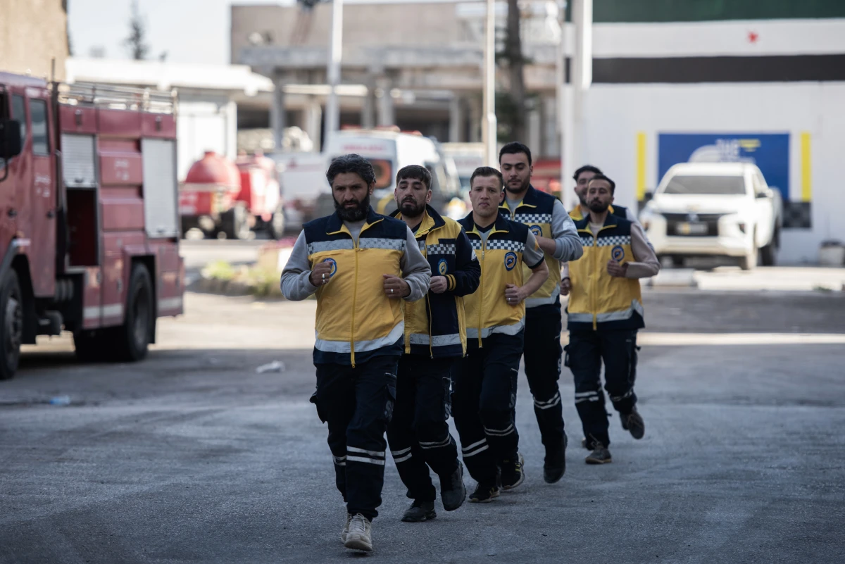 The White Helmets exercise outside the firehouse.