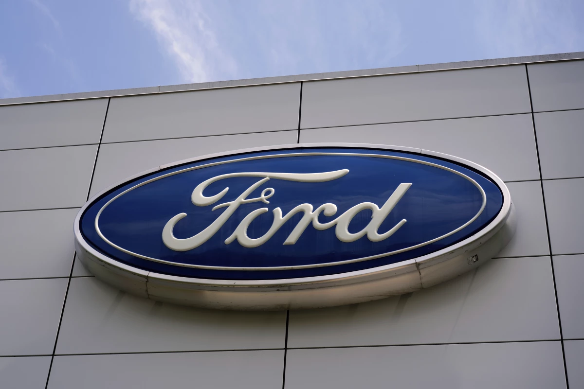 The Ford logo is seen above the entrance to the Ford Motor Company Kentucky Truck Plant in Louisville, Ky.