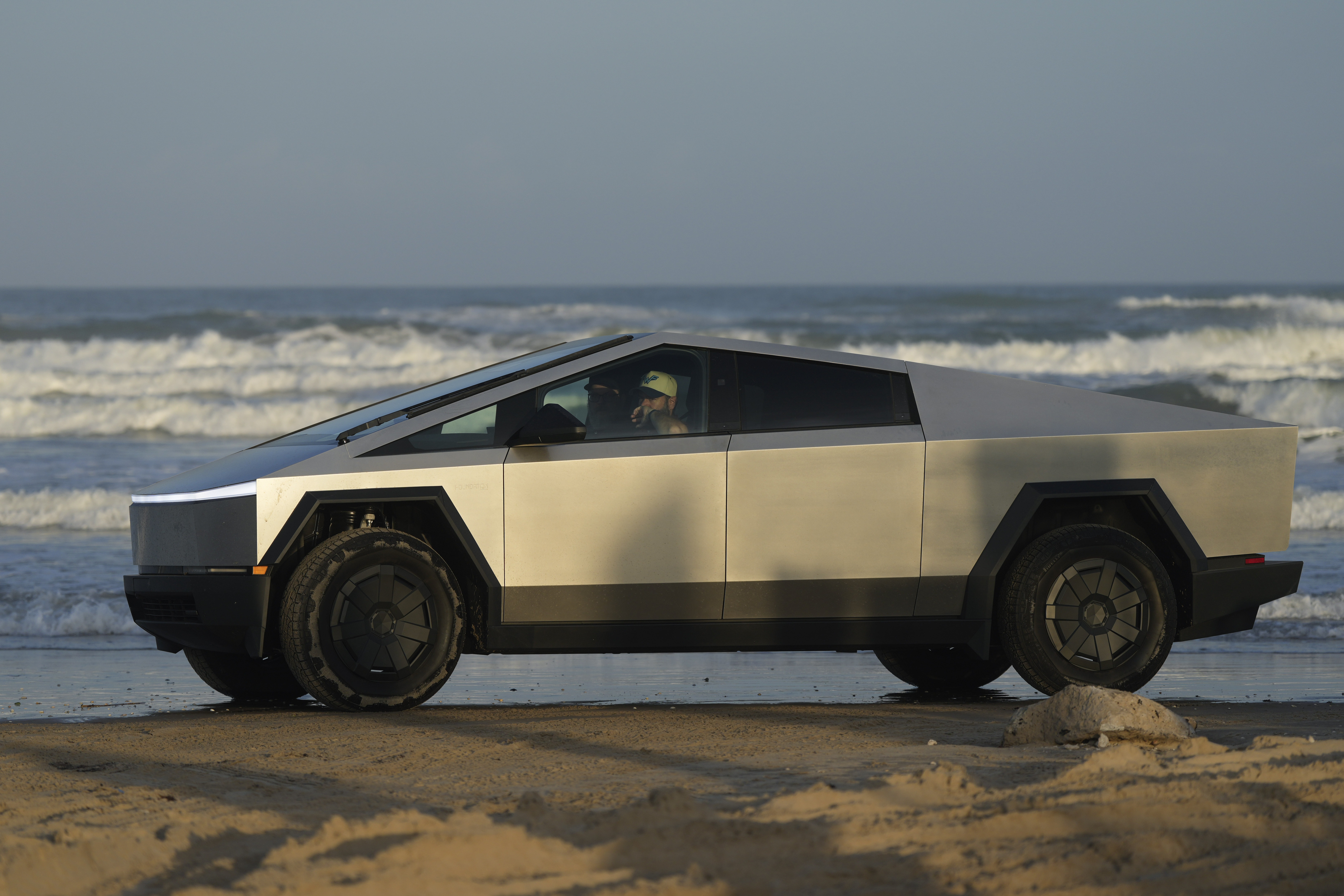 A Tesla Cybertruck moves along the beach in Boca Chica, Texas, on Nov. 18, 2024. (AP)