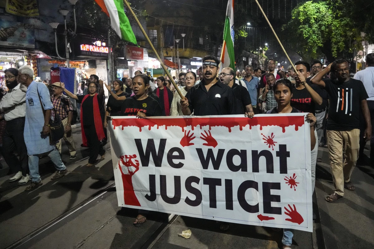 Members of the citizen forum including doctors walk in a rally protesting a rape and murder of a resident doctor in a government hospital early August, in Kolkata, India, on Oct. 1, 2024.