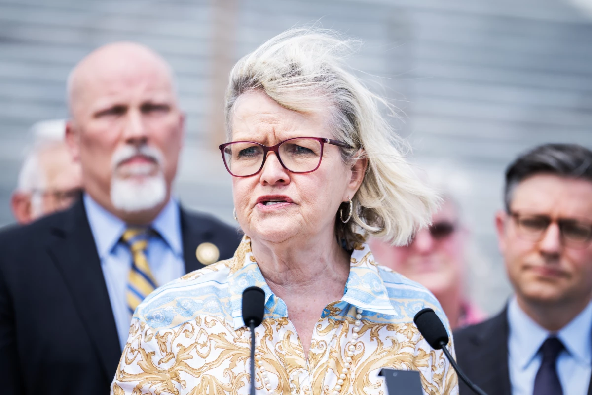 Cleta Mitchell, head of the Election Integrity Network, speaks during a May 2024 news conference outside the U.S. Capitol to introduce the Safeguard American Voter Eligibility (SAVE) Act, which would require proof of U.S. citizenship to register to vote in federal elections. The bill is sponsored by Rep. Chip Roy, R-Texas, who's at left.