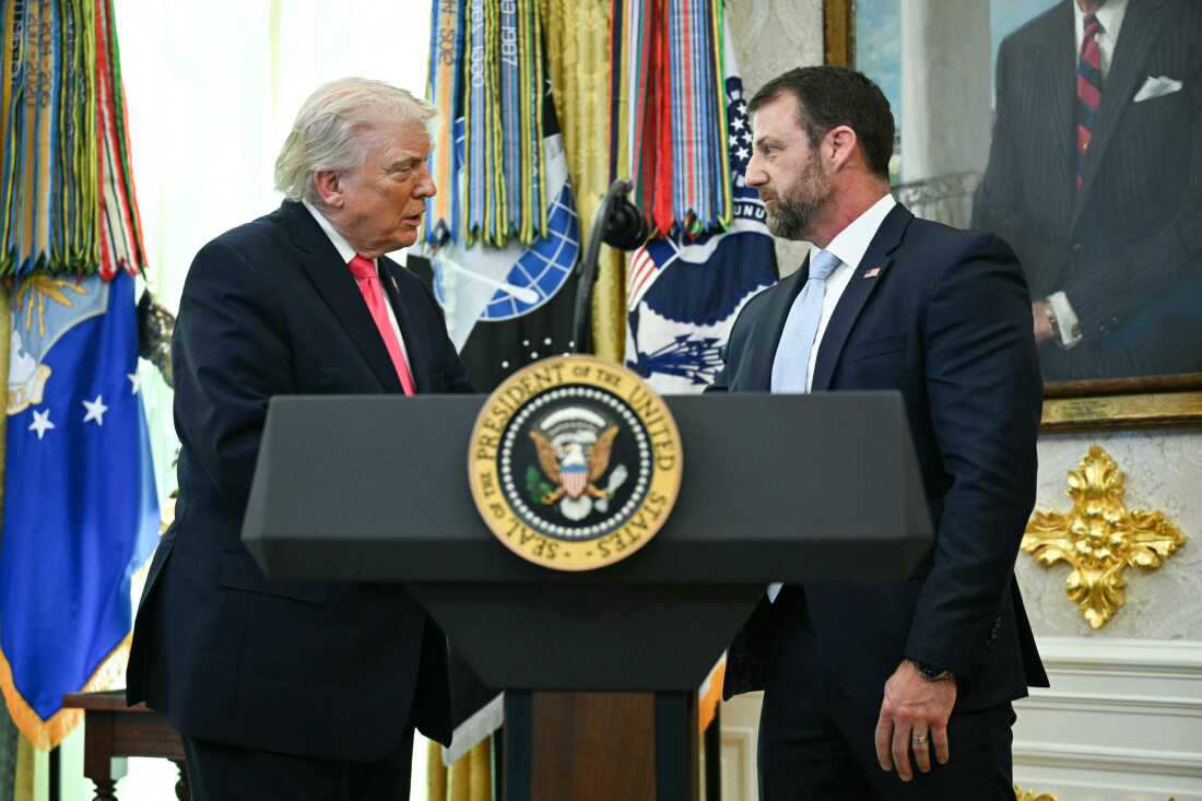 President Trump shakes hands with the newly sworn in Secretary of Homeland Security Markwayne Mullin in the Oval Office on March 24, 2026. Mullin has dialed back some of the aggressive enforcement operations that drew the national spotlight.