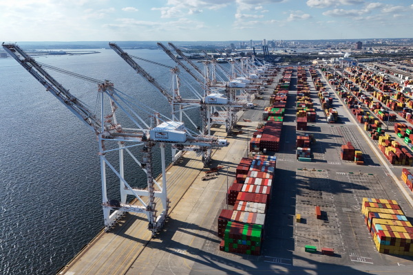 This photo shows shipping containers in various colors stacked in piles at the Port of Baltimore on September 21, 2018.
