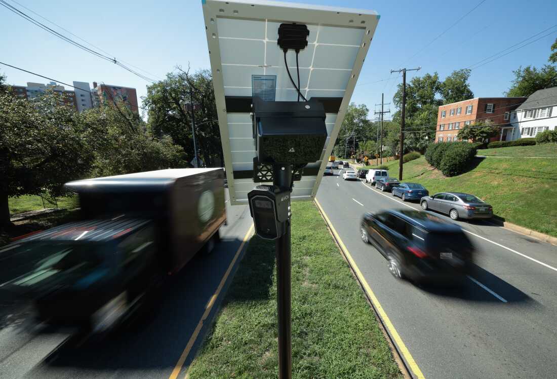 Traffic flows past an Axon brand automated license plate reader (ALPR) camera in Silver Spring, Md. on August 19, 2026. Some cities are making the switch to Axon cameras since law enforcement technology company Flock has come under intense scrutiny over a series of alleged abuses of the company’s tools. (Photo by Chip Somodevilla/Getty Images)